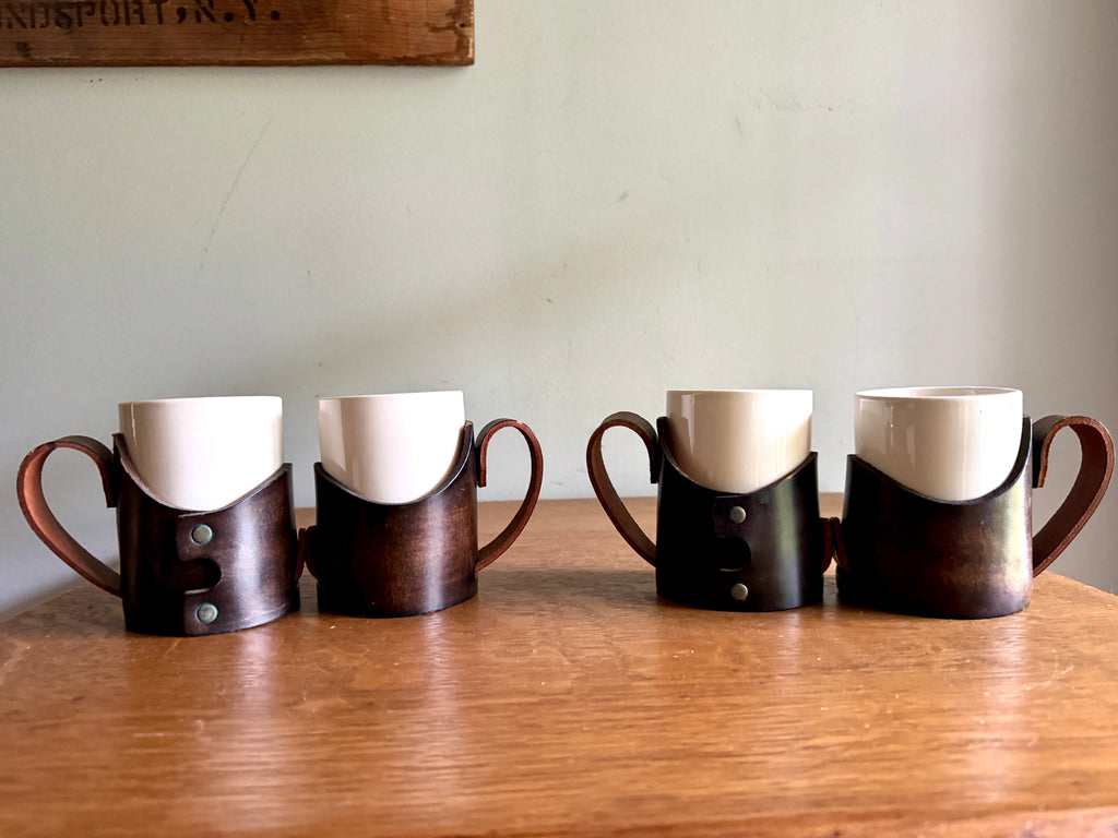 Set of 4 Tooled Leather Mug Holders with Handles and White Ceramic Cups