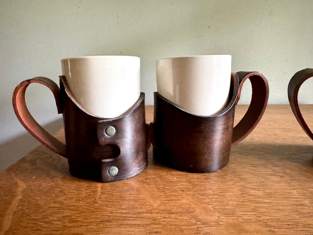Set of 4 Tooled Leather Mug Holders with Handles and White Ceramic Cups