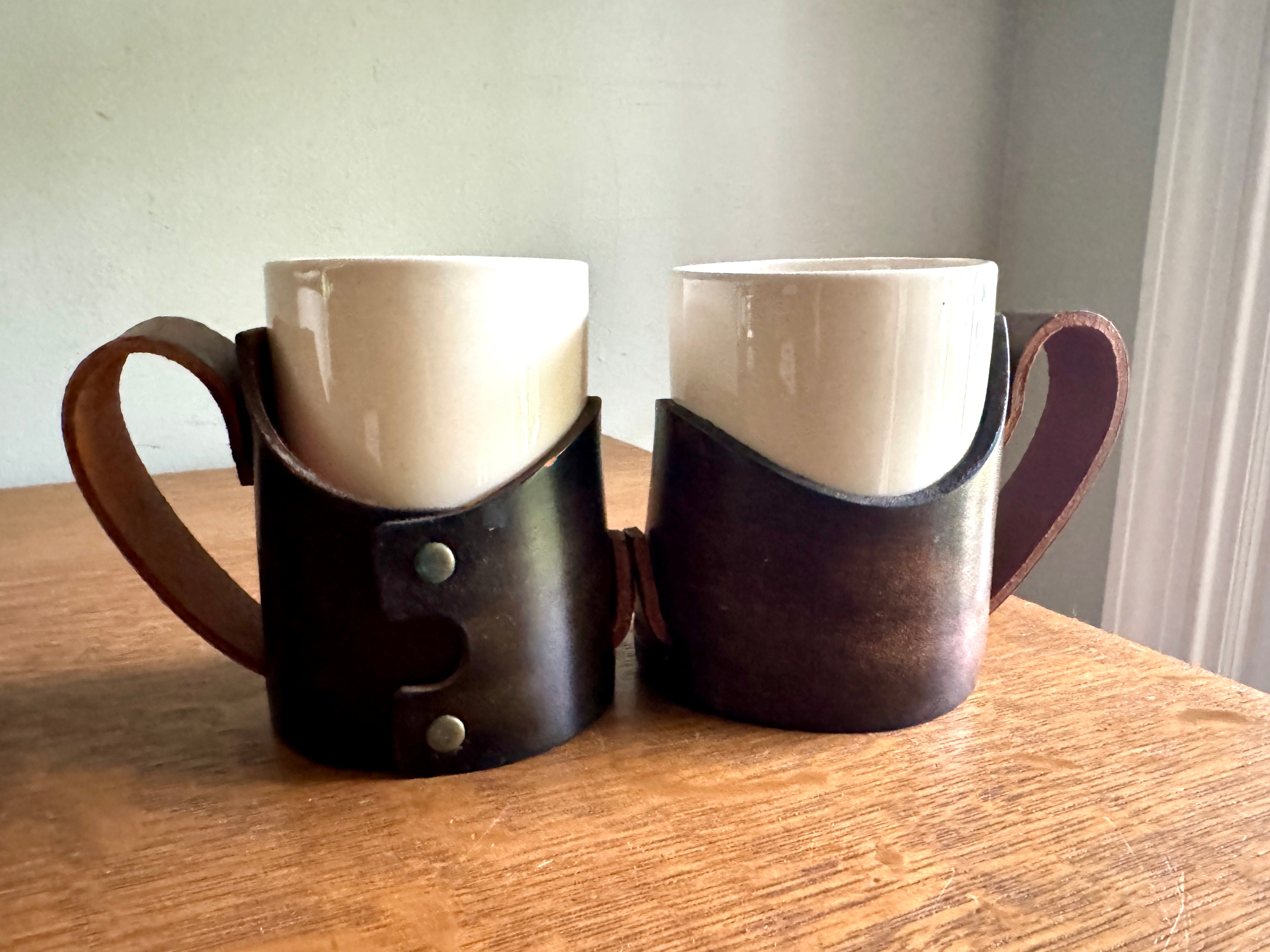 Set of 4 Tooled Leather Mug Holders with Handles and White Ceramic Cups
