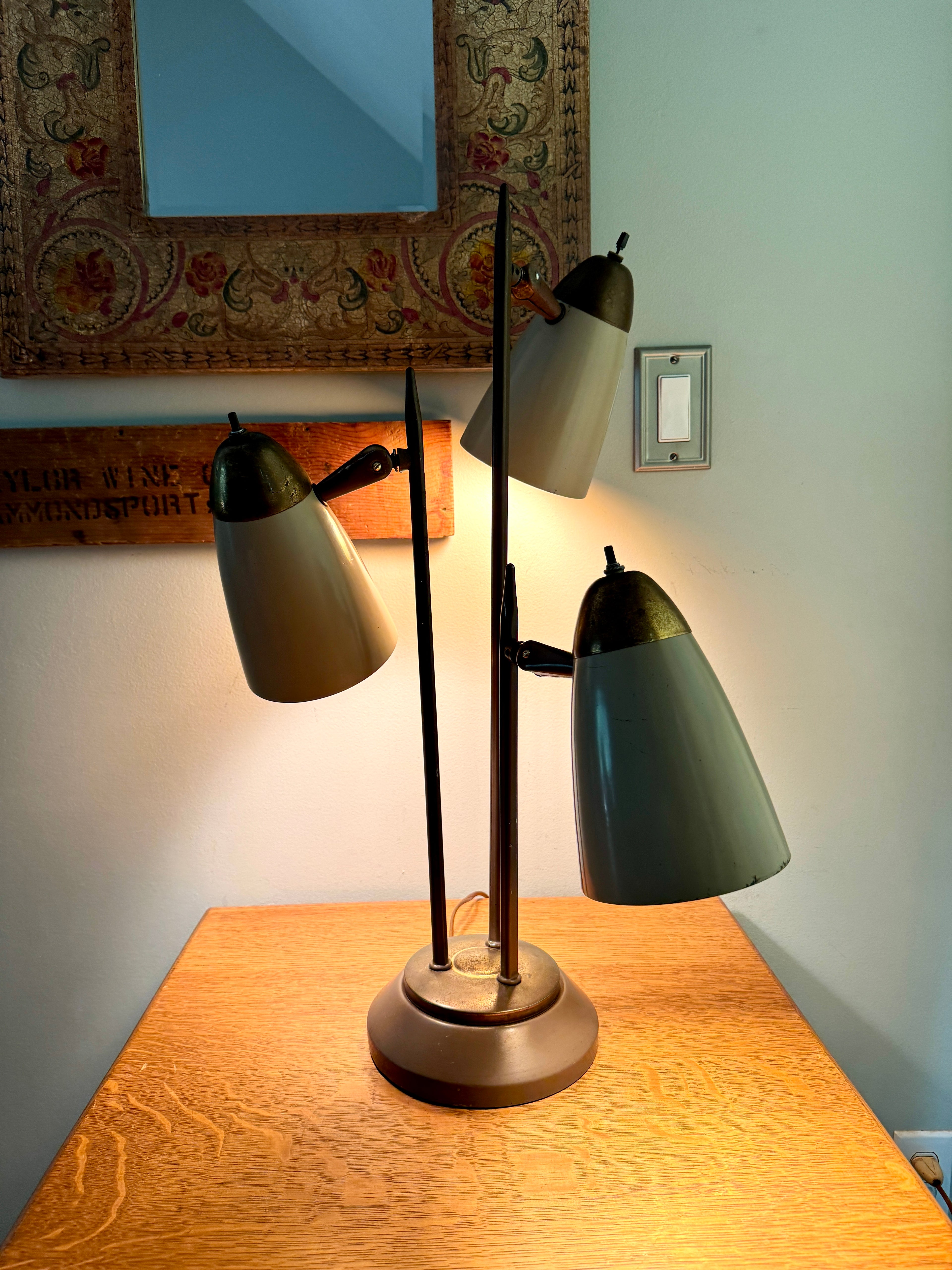 MCM "Triennale" Lamp Attributed to Gerald Thurston for Lightolier, Featuring Beige Bullet Shades and Brass Accents.