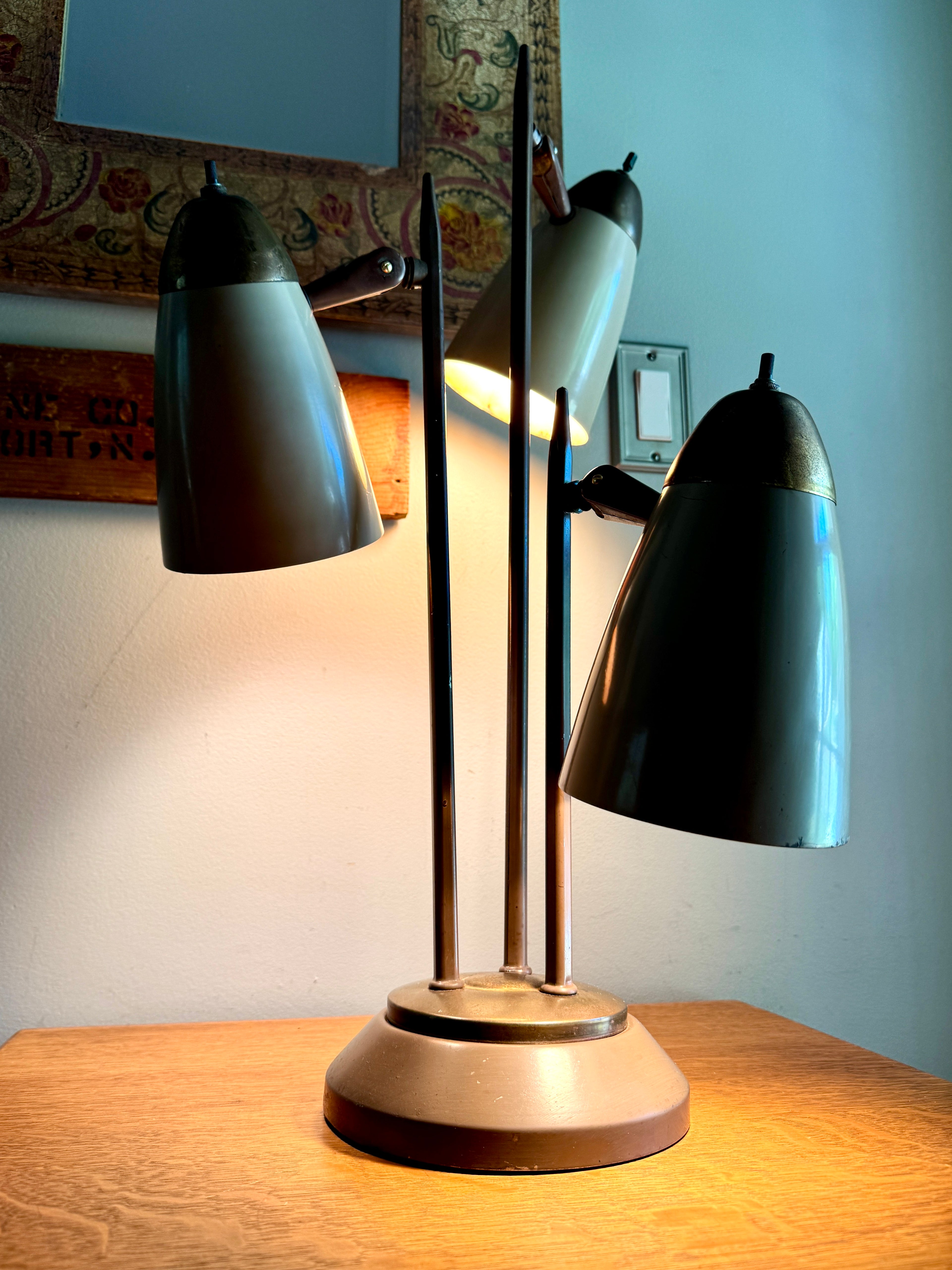 MCM "Triennale" Lamp Attributed to Gerald Thurston for Lightolier, Featuring Beige Bullet Shades and Brass Accents.