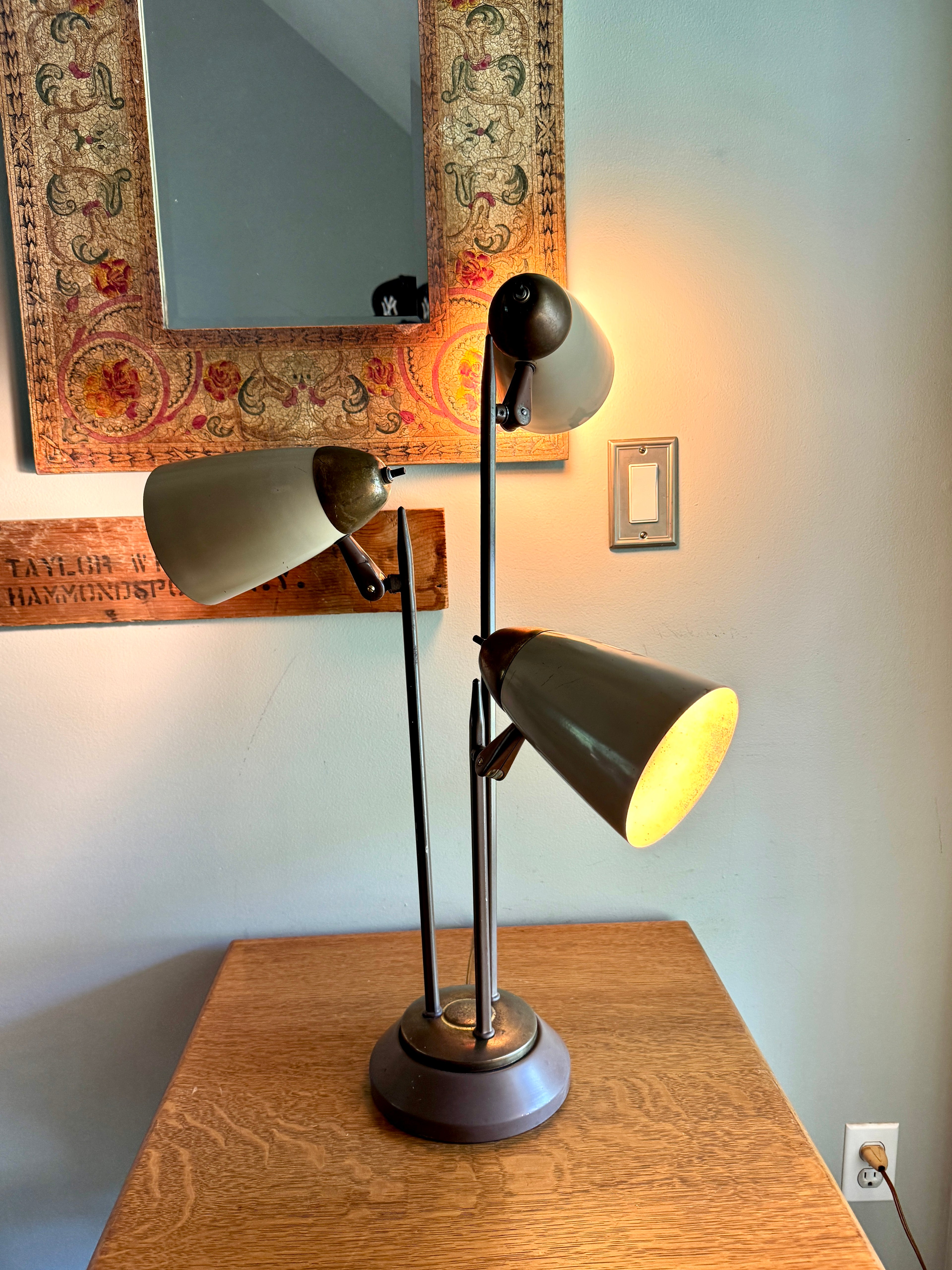 MCM "Triennale" Lamp Attributed to Gerald Thurston for Lightolier, Featuring Beige Bullet Shades and Brass Accents.