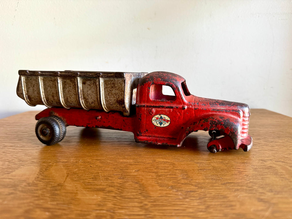 1930's Arcade Cast Iron International Dump Truck | Red Arcade International Cast Iron Truck (No front wheels)