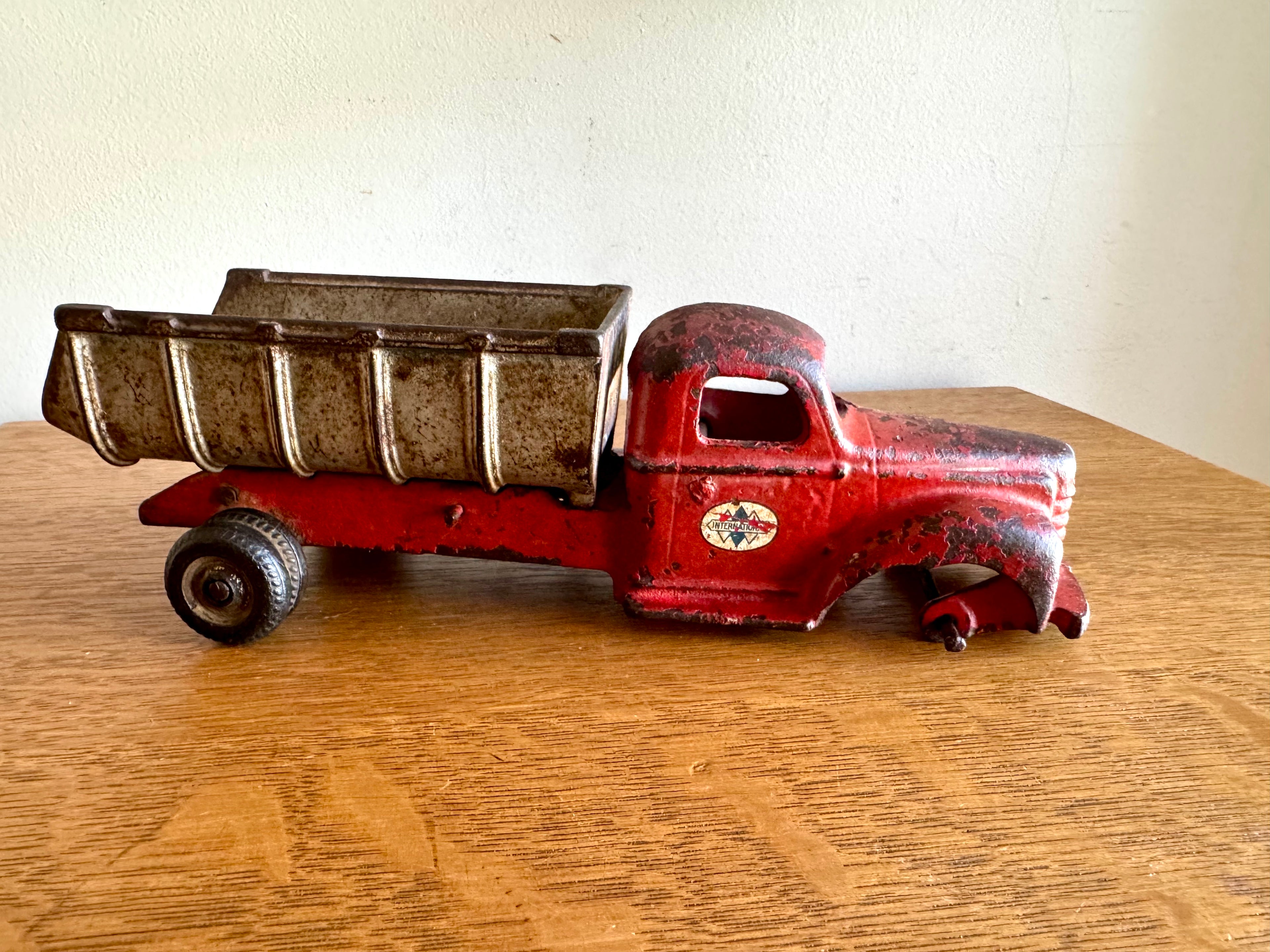1930's Arcade Cast Iron International Dump Truck | Red Arcade International Cast Iron Truck (No front wheels)