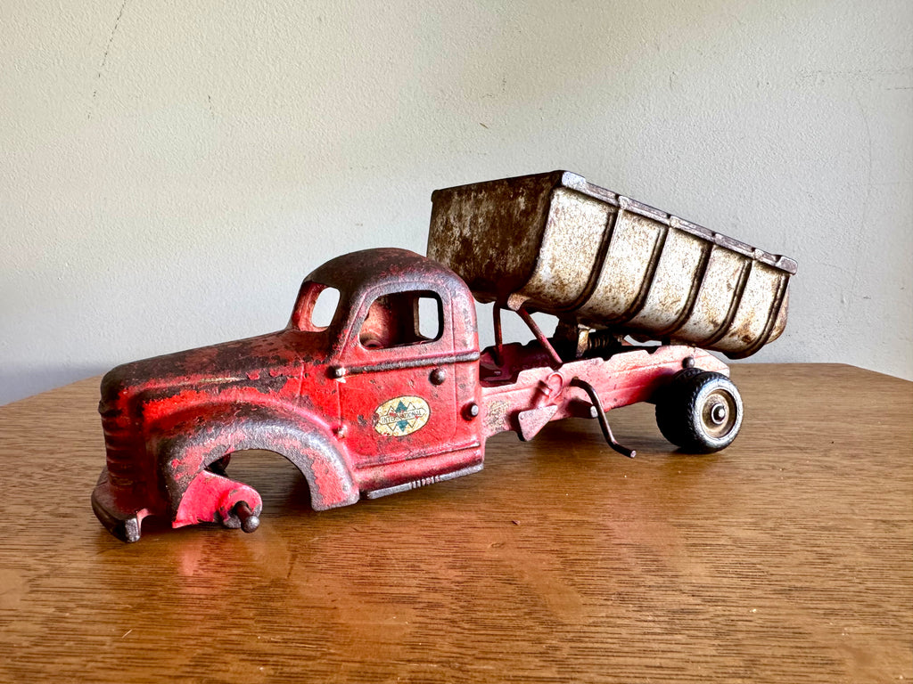 1930's Arcade Cast Iron International Dump Truck | Red Arcade International Cast Iron Truck (No front wheels)