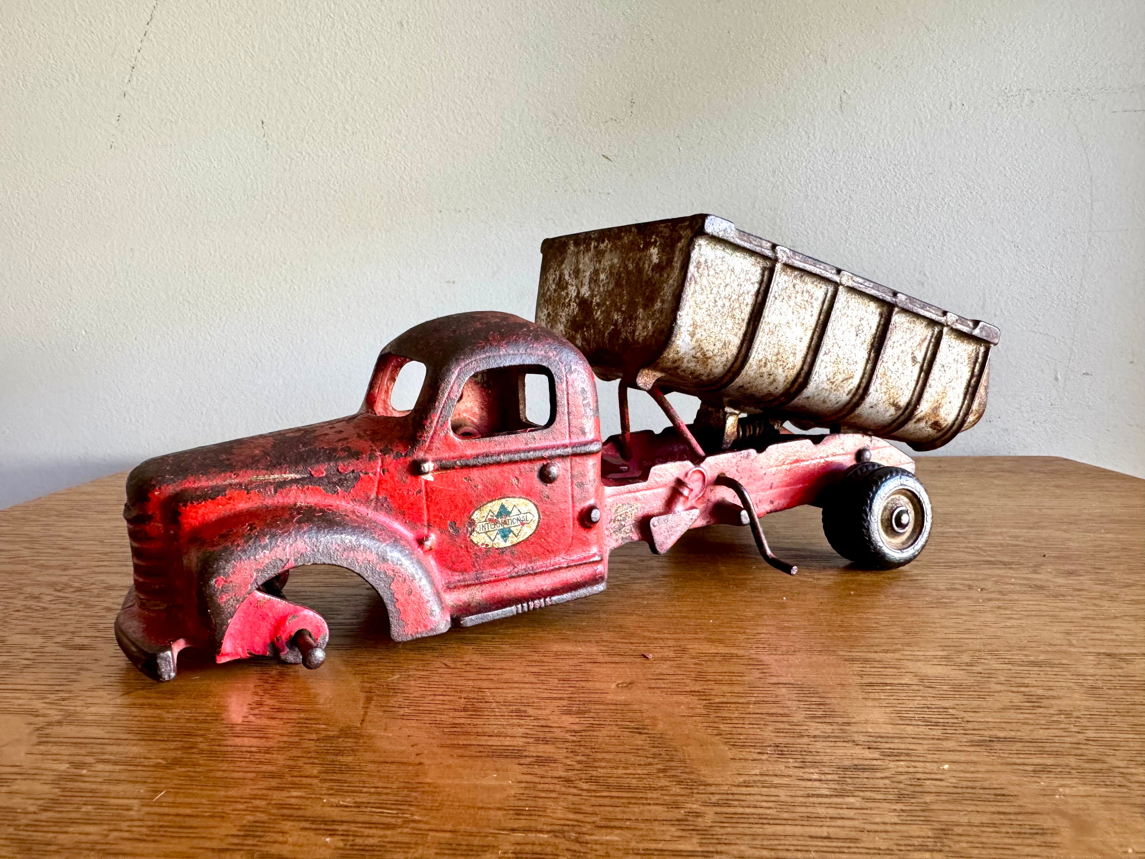 1930's Arcade Cast Iron International Dump Truck | Red Arcade International Cast Iron Truck (No front wheels)