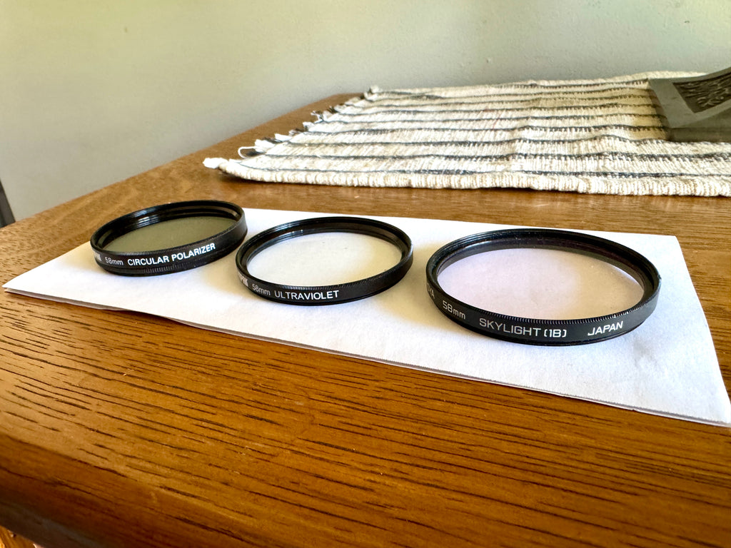 Vtg 58MM lens Filters Sunpak Circular Polarizer & UV Lens and a Hoya Skylight (1B) Lens