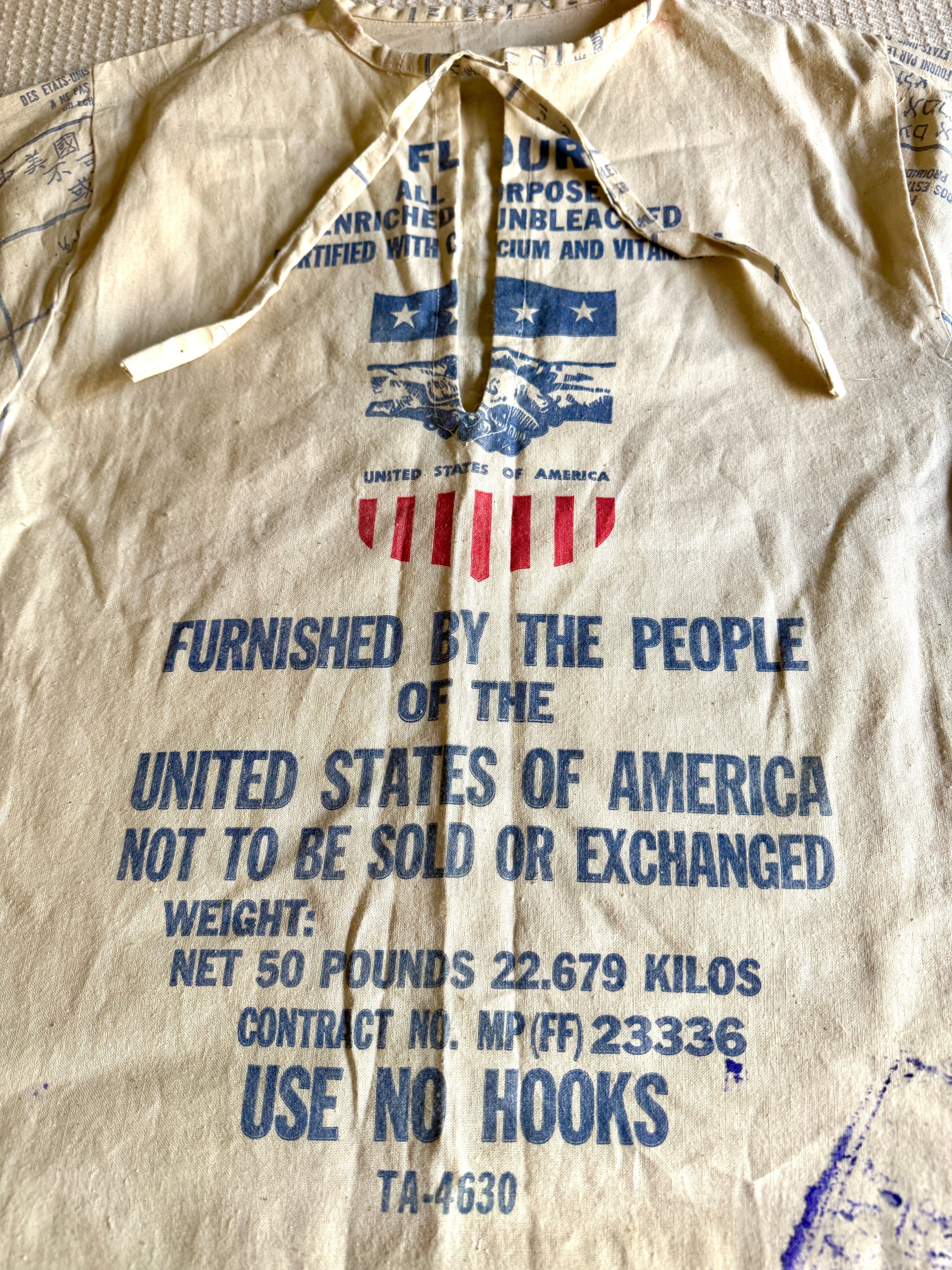 1960's Upcycled US Aid Feed Sack Shirt With Multi Language Bell Sleeves ~ U.S. Aid Feed Sack Shirt