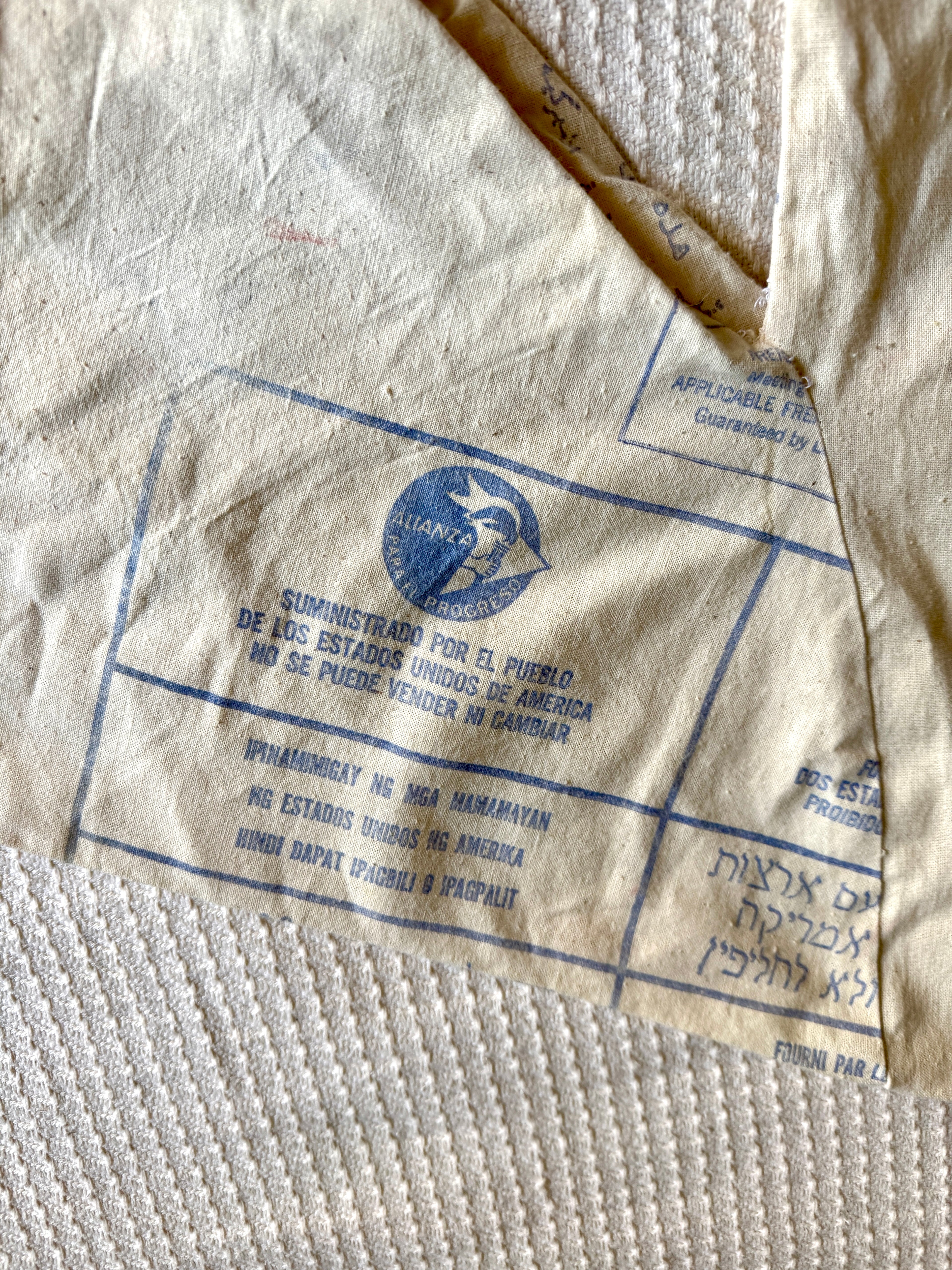 1960's Upcycled US Aid Feed Sack Shirt With Multi Language Bell Sleeves ~ U.S. Aid Feed Sack Shirt