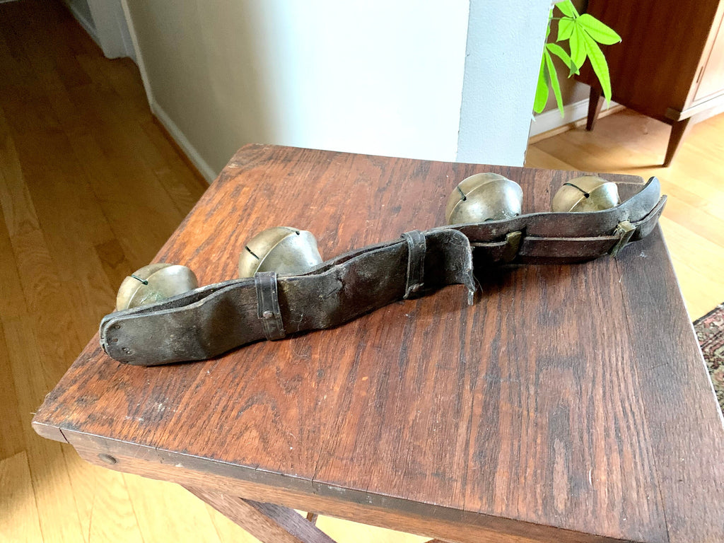 Set of 4 Brass Sleigh Bells | Swedish Style Sleigh Bells | Hip Sleigh Bells On Leather Strap | Antique Sleigh Bells | Distressed Sleigh Bells