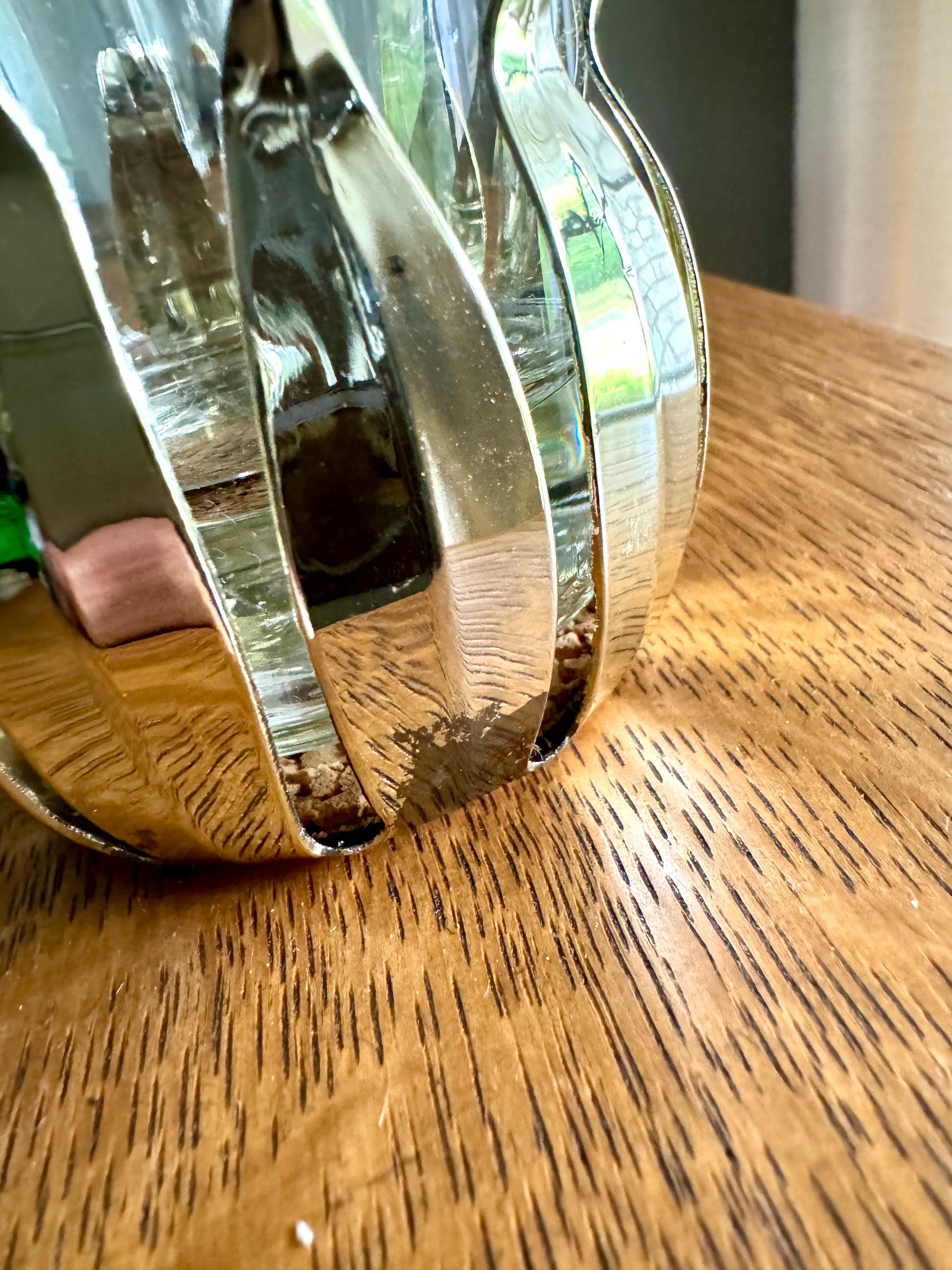 A Set of 3 Lotus Silver Coaster and Silver Rimmed Glasses | 3 Silver Lotus Style Cork Base Coasters and 3 Silver Rimmed Drinking Glasses