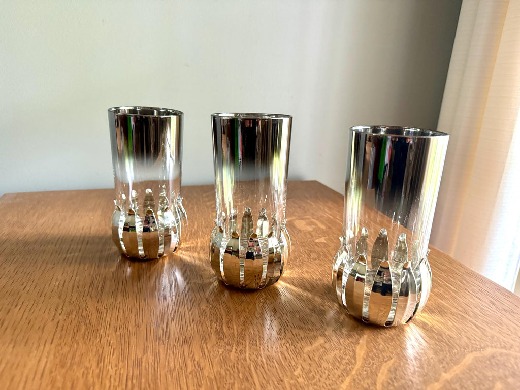 A Set of 3 Lotus Silver Coaster and Silver Rimmed Glasses | 3 Silver Lotus Style Cork Base Coasters and 3 Silver Rimmed Drinking Glasses