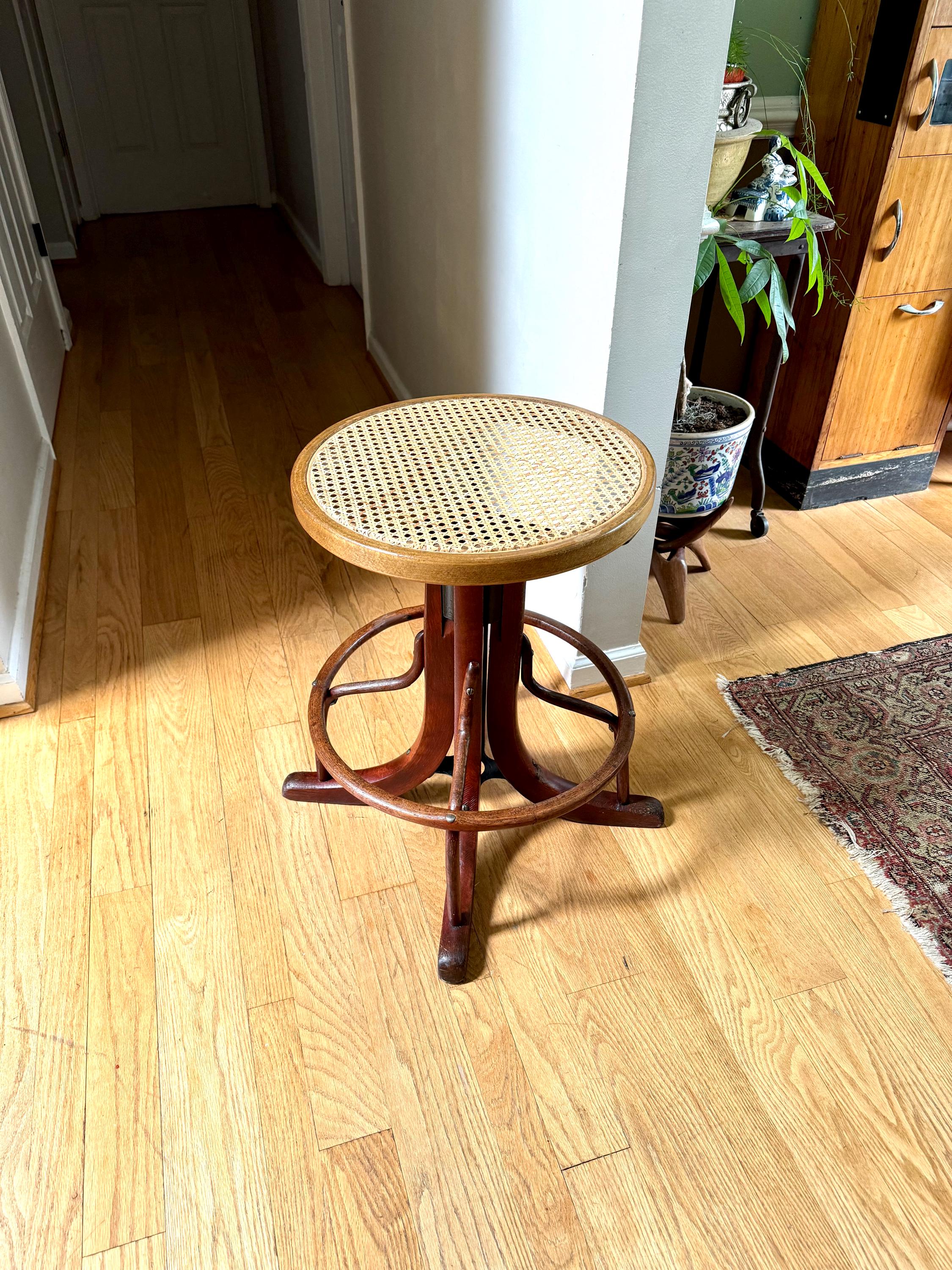 Antique Wood and Cast Iron Adjustable Stool| Bentwood Swivel Caned Top Stool| Wooden Drafting Stool | Adjustable Operators Switchboard Stool